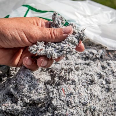 Cellulose,Insulation,For,Walls,And,Floors,In,Hand.,Recycled,Newsprint.
